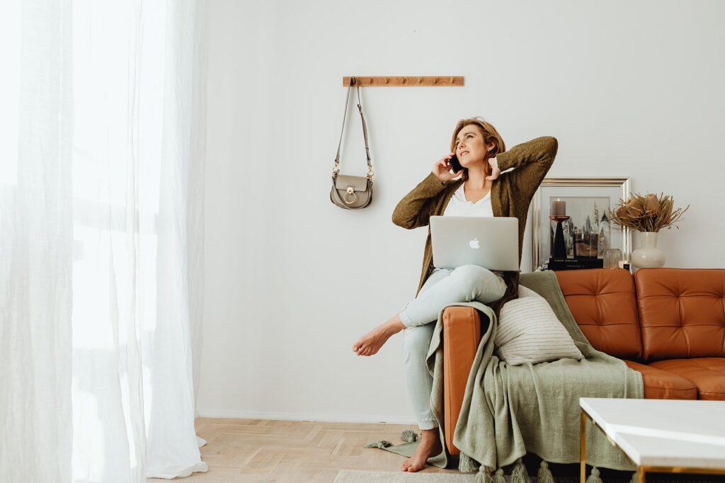 woman, indoors, laptop, macbook, computer, on the phone, young woman, sofa, living room, living room, living room, living room, living room, living room