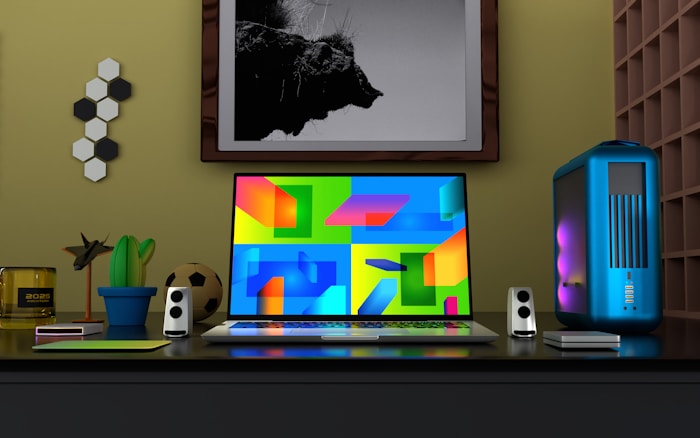 a laptop computer sitting on top of a desk