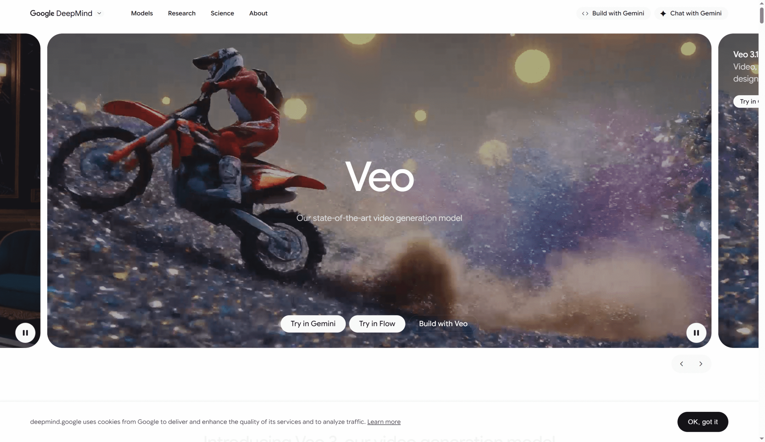 A person in red gear rides a motocross bike on dirt, creating a spray, with the word Veo and website navigation options displayed on the screen—showcase the best image to video AI for action-packed moments. Uploaded on aifreeforever.com